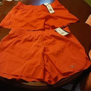 Reebok Women's Vibrant Orange Athletic Shorts